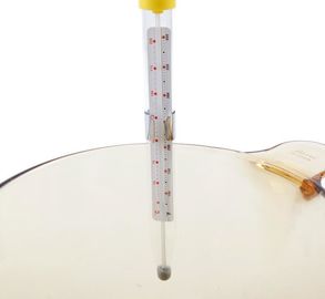 Le thermomètre de cuisson rouge pour cuire, instant a indiqué la sécurité élevée de thermomètre de cuisine